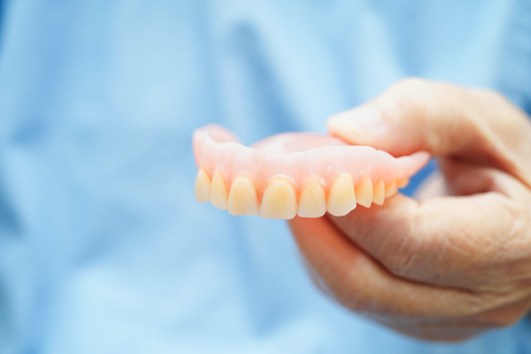 When You Should Choose Denture Repair Vs  Replacement